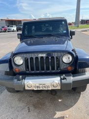 Used 2013 Jeep Wrangler Unlimited Sahara w/ Dual Top Group image 1