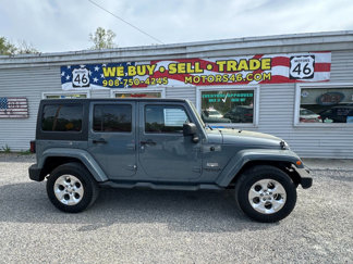 Used 2014 Jeep Wrangler Unlimited Sahara w/ Dual Top Group image 1