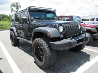 Used 2014 Jeep Wrangler Unlimited Sport image 1