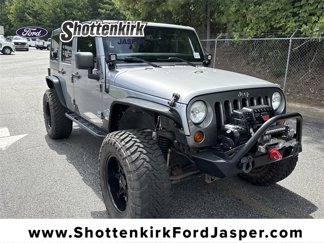 Used 2013 Jeep Wrangler Unlimited Sport image 1