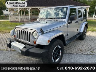 Used 2013 Jeep Wrangler Unlimited Sahara w/ Dual Top Group image 1