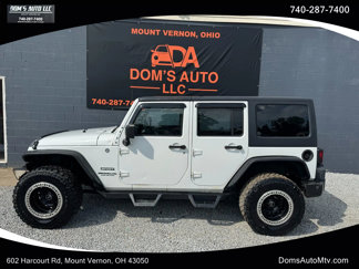 Used 2012 Jeep Wrangler Unlimited Sport image 1