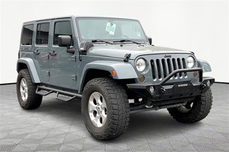 Used 2014 Jeep Wrangler Unlimited Sahara w/ Dual Top Group image 1