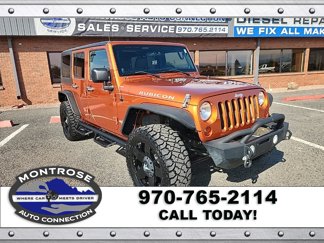 Used 2011 Jeep Wrangler Unlimited Rubicon w/ Dual Top Group image 1