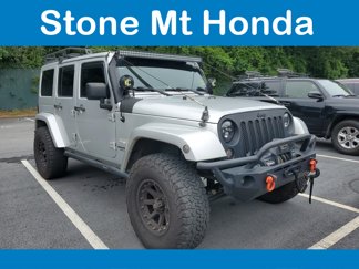 Used 2012 Jeep Wrangler Unlimited Sahara w/ Mopar Chrome Edition Group image 1