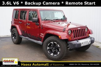 Used 2012 Jeep Wrangler Unlimited Sahara w/ Dual Top Group image 1