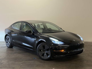 Used 2021 Tesla Model 3 Standard Range Plus image 1