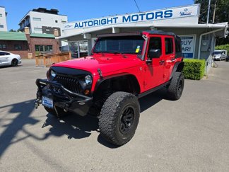 Used 2012 Jeep Wrangler Unlimited Sport image 1