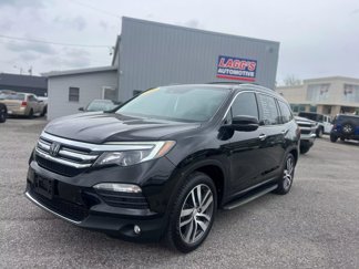 Used 2016 Honda Pilot Touring image 1