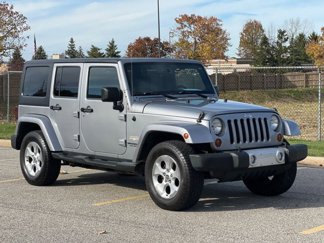 Used 2013 Jeep Wrangler Unlimited Sahara w/ Dual Top Group image 1