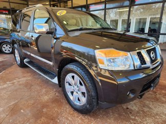 Used 2011 Nissan Armada Platinum w/ 2nd Row Captain Seat Pkg image 1
