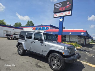 Used 2013 Jeep Wrangler Unlimited Sport image 1