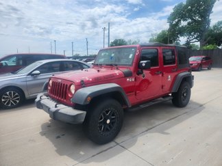 Used 2014 Jeep Wrangler Unlimited Sport image 1