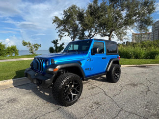 Used 2024 Jeep Wrangler Sport image 1