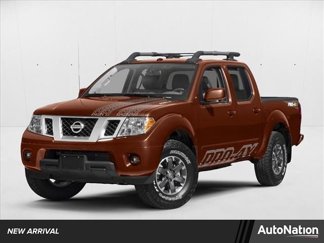Used 2016 Nissan Frontier PRO-4X image 1