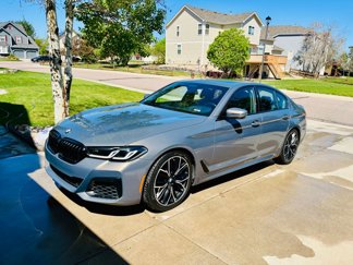Used 2022 BMW M550i xDrive w/ Executive Package image 1