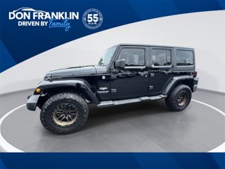 Used 2014 Jeep Wrangler Unlimited Sahara image 1