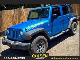 Used 2010 Jeep Wrangler Unlimited Sport image 1