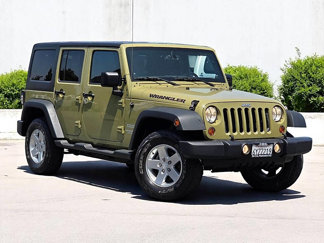 Used 2013 Jeep Wrangler Unlimited Sport image 1
