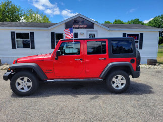Used 2013 Jeep Wrangler Unlimited Sport image 1
