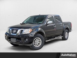 Used 2015 Nissan Frontier SV image 1