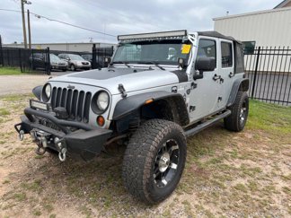 Used 2010 Jeep Wrangler Unlimited Sport image 1