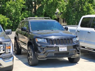 Used 2015 Jeep Grand Cherokee Altitude image 1
