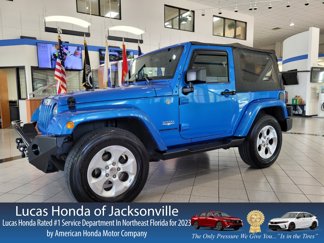 Used 2015 Jeep Wrangler Sahara image 1