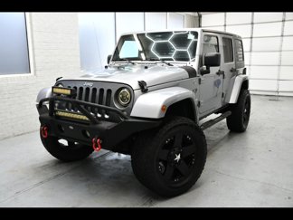 Used 2014 Jeep Wrangler Unlimited Sport image 1