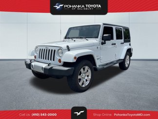Used 2013 Jeep Wrangler Unlimited Sahara w/ Dual Top Group image 1