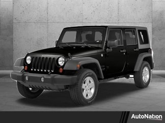 Used 2014 Jeep Wrangler Unlimited Sahara w/ Dual Top Group image 1