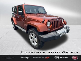 Used 2014 Jeep Wrangler Unlimited Sahara w/ Dual Top Group image 1
