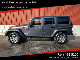 Used 2014 Jeep Wrangler Unlimited Rubicon w/ Dual Top Group image 1