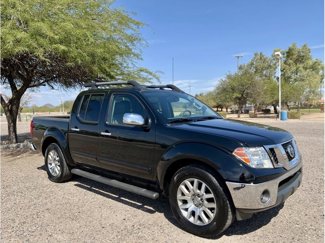 Used 2012 Nissan Frontier SL image 1