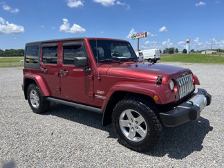 Used 2011 Jeep Wrangler Unlimited Sahara w/ Dual Top Group image 1