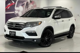 Used 2016 Honda Pilot Touring image 1