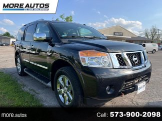 Used 2014 Nissan Armada Platinum w/ 2nd Row Captain Seat Package image 1