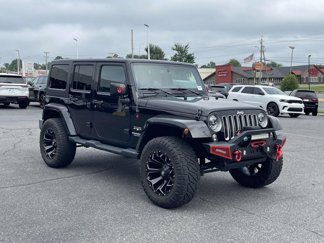 Used 2016 Jeep Wrangler Unlimited Sahara w/ Connectivity Group image 1