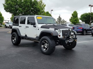 Used 2012 Jeep Wrangler Unlimited Sport image 1