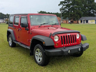 Used 2010 Jeep Wrangler Unlimited Sport image 1