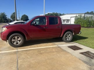 Used 2012 Nissan Frontier SV image 1