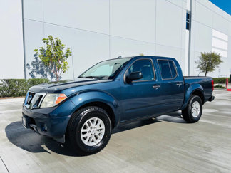 Used 2016 Nissan Frontier SV image 1
