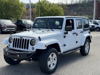 Used 2016 Jeep Wrangler Unlimited Sahara image 1