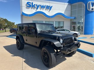 Used 2016 Jeep Wrangler Unlimited Sport image 1