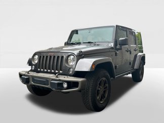 Used 2016 Jeep Wrangler Unlimited Sahara image 1