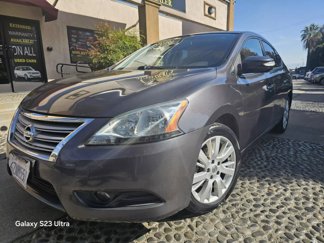 Used 2013 Nissan Sentra SL w/ Navigation Pkg image 1
