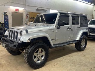 Used 2011 Jeep Wrangler Unlimited Sahara image 1
