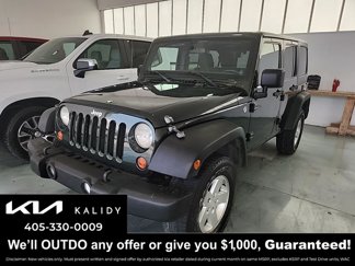 Used 2011 Jeep Wrangler Unlimited Sport image 1