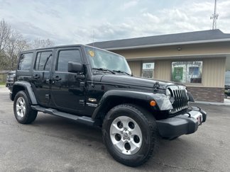Used 2015 Jeep Wrangler Unlimited Sahara image 1