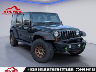 Used 2011 Jeep Wrangler Unlimited Sport image 1